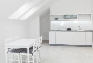 Kuchyňa alebo kuchynka v ubytovaní Corso Lux Apartman