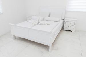 Posteľ alebo postele v izbe v ubytovaní Corso Lux Apartman