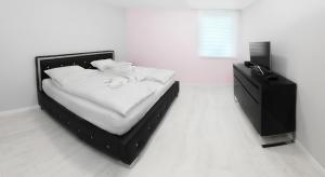 Posteľ alebo postele v izbe v ubytovaní Corso Lux Apartman