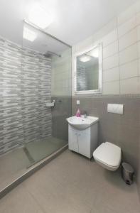 Kúpeľňa v ubytovaní Corso Lux Apartman
