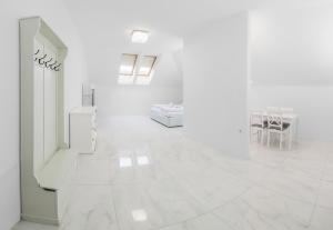 Posteľ alebo postele v izbe v ubytovaní Corso Lux Apartman