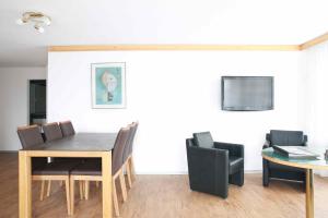 TV a/nebo společenská místnost v ubytování Saaserhof Apartments