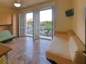 A bed or beds in a room at Ligure Residence