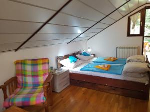 Voodi või voodid majutusasutuse Nena & Rale Rooms toas