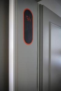 a door with a speed limit sign on it at Carina - Design&Lifestyle hotel in Zermatt