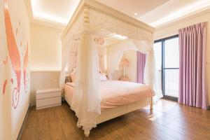 Llit o llits en una habitació de Fun Homestay