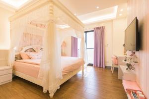 Llit o llits en una habitació de Fun Homestay