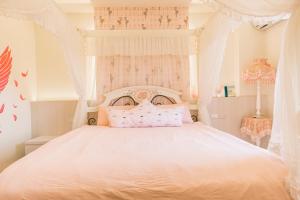 Llit o llits en una habitació de Fun Homestay