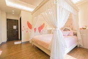 Llit o llits en una habitació de Fun Homestay