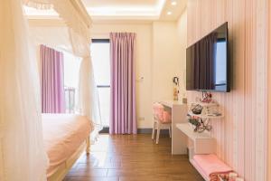 Televisor o centre d'entreteniment de Fun Homestay