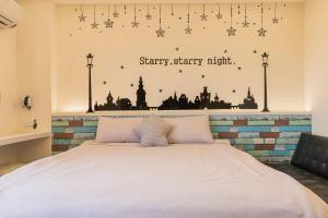 Llit o llits en una habitació de Fun Homestay