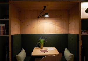 a table with stars on it in a room at Carina - Design&Lifestyle hotel in Zermatt