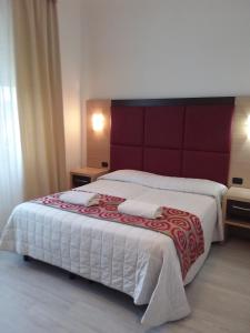 Cama o camas de una habitación en Hotel Playa