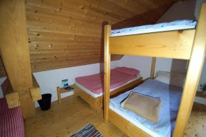 Voodi või voodid majutusasutuse Straniger Alm toas