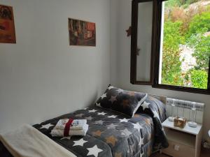 Cama o camas de una habitación en A los Ojos del Río Duero