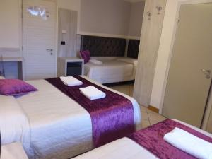 Кровать или кровати в номере Hotel Playa