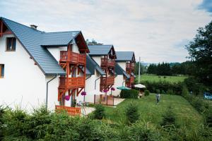 Vonkajšia záhrada v ubytovaní Apartamenty Pod Lipami