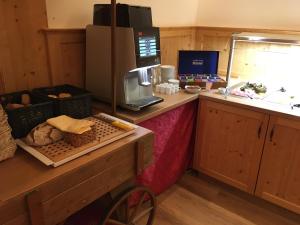 Küche/Küchenzeile in der Unterkunft Hotel Vallüla