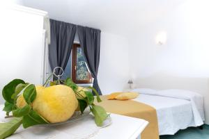 Postel nebo postele na pokoji v ubytování O' Lattariello