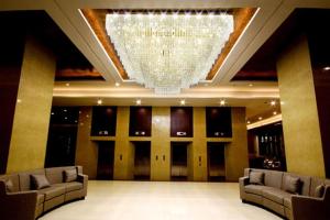Posezení v ubytování Mandarin Plaza Hotel