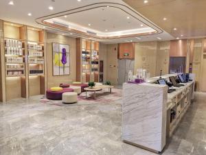 a lobby of a cosmetics store with a counter at Lavande Hotel Ordos Ejinholo street in Ordos