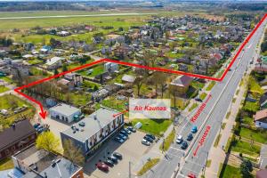 an aerial view of a city with a red arrow pointing to an air kenn at Air Kaunas in Karmėlava +5 photos