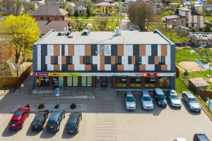 an overhead view of a parking lot in front of a building at Air Kaunas in Karmėlava