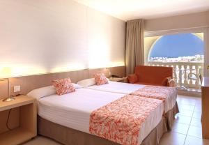 Posteľ alebo postele v izbe v ubytovaní Gran Hotel del Coto
