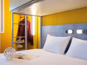 Postel nebo postele na pokoji v ubytování ibis budget Amsterdam Airport