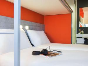 Postel nebo postele na pokoji v ubytování ibis budget Amsterdam Airport