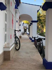 a bike parked on the side of a building at Hotel La Villoría in Medina Sidonia