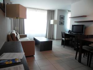 TV a/nebo společenská místnost v ubytování Residence Services Calypso Calanques Plage