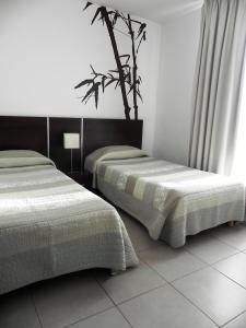 Postel nebo postele na pokoji v ubytování Residence Services Calypso Calanques Plage