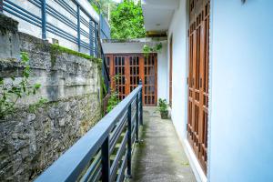 A balcony or terrace at Kandyan Nethu Stay
