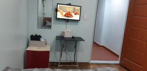 TV a/nebo společenská místnost v ubytování Kimstay 9