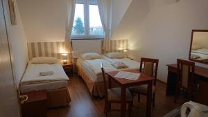 Łóżko lub łóżka w pokoju w obiekcie Letnia willa Jacuzzi & Sauna