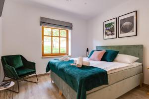 Posteľ alebo postele v izbe v ubytovaní Biała Owieczka B&B Szczyrk