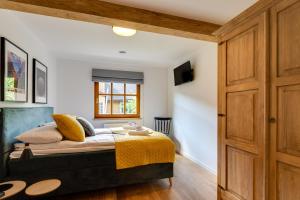 Posteľ alebo postele v izbe v ubytovaní Biała Owieczka B&B Szczyrk