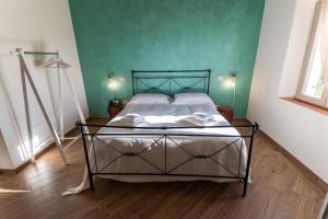 Fattoria L'Olmetto客房内的一张或多张床位