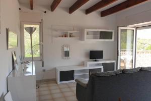 TV a/nebo společenská místnost v ubytování Brisa, apartamento de tres habitaciones B