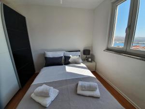 Postel nebo postele na pokoji v ubytování Apartment Moon Island