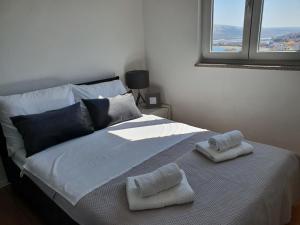 Postel nebo postele na pokoji v ubytování Apartment Moon Island