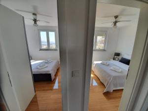 Postel nebo postele na pokoji v ubytování Apartment Moon Island