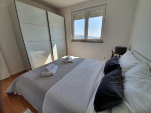 Postel nebo postele na pokoji v ubytování Apartment Moon Island