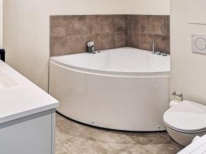 Koupelna v ubytování Luxury Spa Apartment in Sondervig - By Traum Ferienwohnungen