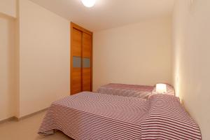 Postel nebo postele na pokoji v ubytování Flatguest Costa Calma + Beach + 2Bdr + Pool
