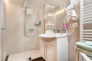 Bagno di Erlebnis-Hotel-Appartements