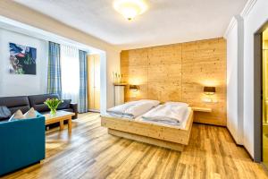 Postel nebo postele na pokoji v ubytování Hotel Heigl