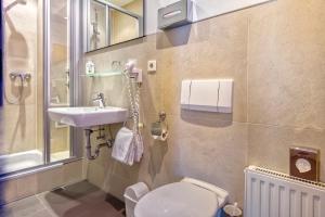 Koupelna v ubytování Hotel Heigl