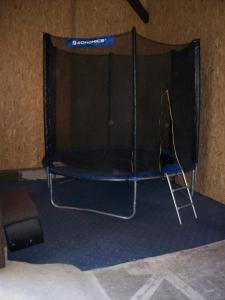 a golf cart with a net in a room at apartment fewo efosa in Kappel-Grafenhausen